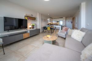 Casa Banderas garden level pool front apartment