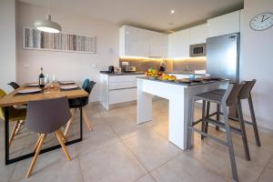 Casa Banderas garden level pool front apartment