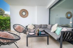 Casa Banderas garden level pool front apartment