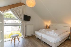 Welcome in - Zonnedorp Kavel 10 Renesse | Villa nabij het Strand & met Ruime Tuin