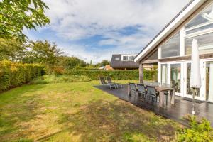 Welcome in - Zonnedorp Kavel 10 Renesse | Villa nabij het Strand & met Ruime Tuin