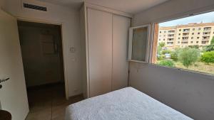 PALMERAIE 317-climatisation-plage et commerces à pieds