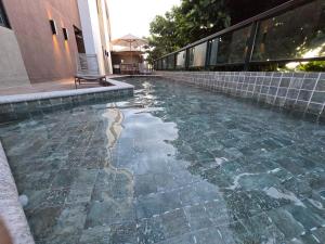 Flat 100m da praia, piscina, churrasqueira e sauna BY Oasis Ferias