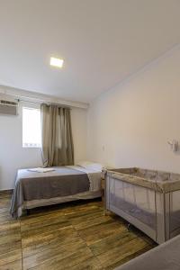 Casa Capri: 3 Suítes e Lazer ao Lado da Praia