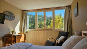 Studio cosy au Lioran - Vue montagne, Lit Queen, Parking privé - Ménage inclus