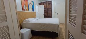 Apartamento térreo com ar condicionado e 2 suítes bem localizado