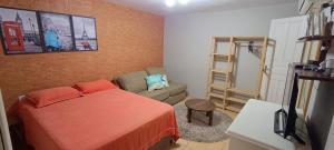 Apartamento térreo com ar condicionado e 2 suítes bem localizado