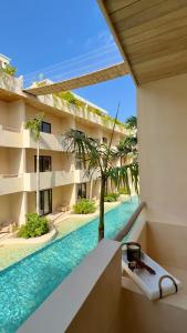 COCAY TULUM By SANDY POWERFUL