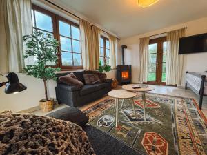 Stylová Lodge s vlastním koupáním & pergolou