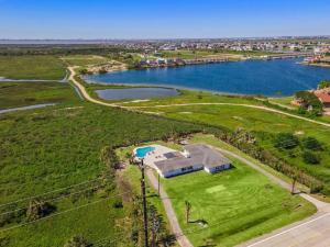 Vacation home with private pool and game room, minutes from the beach