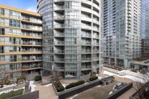 Stylish 1BR Condo with Patio Steps from Waterfront