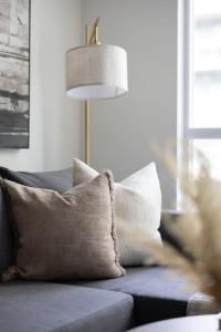 Stylish 1BR Condo with Patio Steps from Waterfront