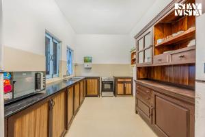 StayVista at Villa Nimaya with Lawn & Pool