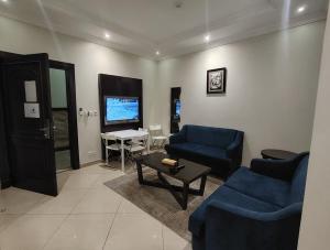 فندق المهاجر للشقق المخدومة بالبوادي