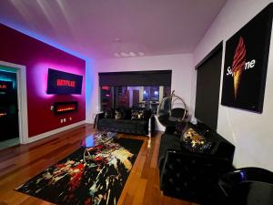 The Red Room - Cloud Ceilings - Patio & Bathroom TV