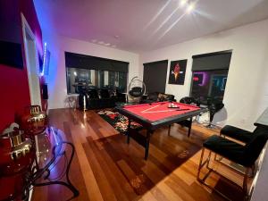 The Red Room - Cloud Ceilings - Patio & Bathroom TV