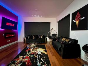 The Red Room - Cloud Ceilings - Patio & Bathroom TV