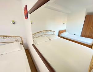 Apartamente & Dhoma Me Qera Ditore