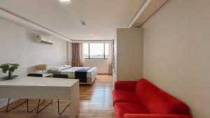 Flat Aconchegante no Centro, com Sofá e Geladeira