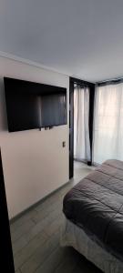 Disfruta de una estadía inolvidable en el corazón de Santiago, Hasta 3 personas