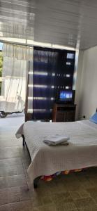 HABITACION EN CASA PARTICULAR A UNoS PASOS DE LA UNAD