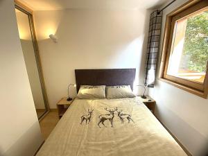 Charmant appartement 3 pièces à Méribel avec mezzanine, balcon et terrasse - FR-1-411-997