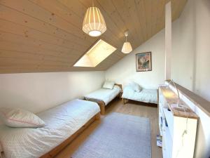 Charmant appartement 3 pièces à Méribel avec mezzanine, balcon et terrasse - FR-1-411-997