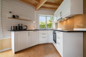 Kugelhaus Kirana - Ruhiges Naturdomizil in runder Bauweise am Waldrand des Tollensesees