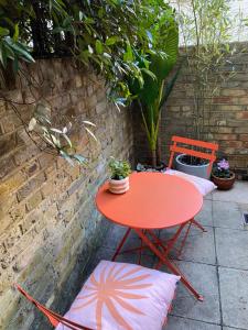 Peaceful duplex apartment with patio in Central London