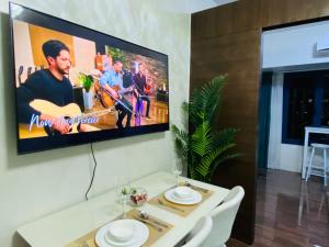 Tropical Chic Escape With City lights View- Modern Scandi