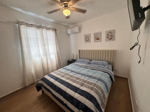 Cozy Apt Steps from Los Corales Beach