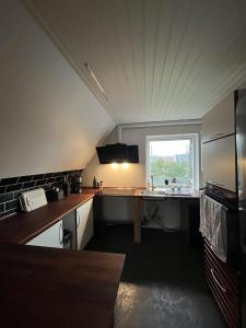 Lejlighed med højt til loftet