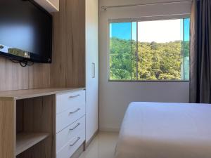 Bombinhas, seu refugio com vista para a natureza