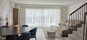 Newly built townhouse with spectacular sea views in an idyllic setting just 15 min from Marbella