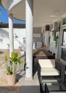 Casa Guarujá Esquina com Beira mar com Piscina grande na Enseada Pé na areia 50 metros