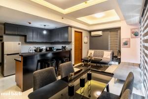 Luxury 1 BR in Venice Residences, Mckinley Hill Fast Wi-Fi Washer