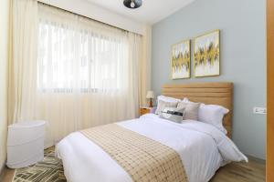 celestial suites apartment with heated swimming pool well equipped gym ample parking space children playing ground and relaxing rooftop with amazing scenic views