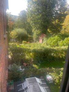 Stort værelse udlejes i herskabslejlighed midt i Odense by