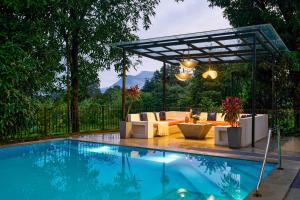 SaffronStays Ira - 3BR vegetarian pet-friendly villa with pool, gazebo & terrace glasshouse in Karjat