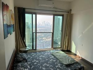 Private Room in 2 BHK Apartment with City & Sea View