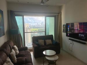 Private Room in 2 BHK Apartment with City & Sea View