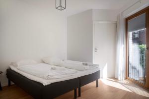 Modern Apartment by the Mermaid Statue