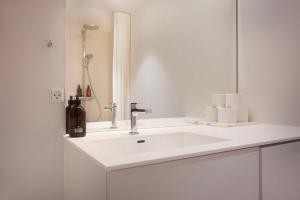 Modern Apartment by the Mermaid Statue