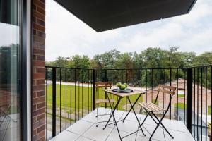 Rakowicka Modern Apartment with Bathtub By Noclegi Renters