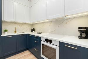 Unique 1 Bedroom Apartment with Parking and Gym Access by Noclegi Renters