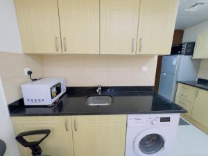Mahenti - Elite 1 · Large balcony withu need