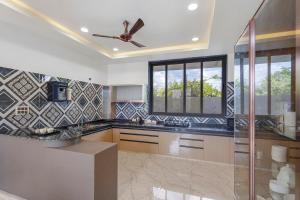 Shreya Blossom Retreat 4-BHK Retreat With Private Pool, Gazebo, Garden, Bar & Scenic Aravali Views