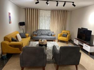 A Luxury Hotel Appartment at NEW GIZA Imperial Compound قريبة جدا للمتحف المصري الجديد