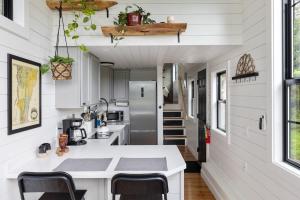 Haven Tiny House w hot tub on river near Stowe