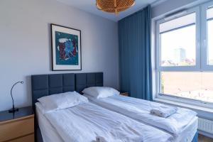 Modern, two bedroom, shipyard view apartment by Grand Apartments